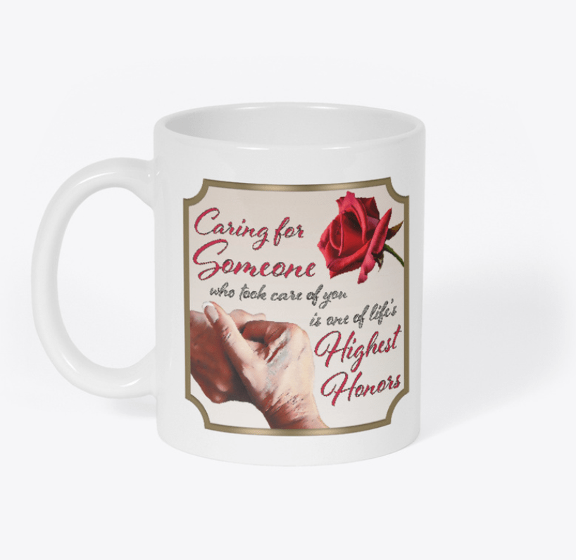 Cup with a Caregiver Blessing showing clasped hands and a red rose