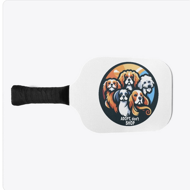 Pickleball paddle with Adopt, don't shop showing five rescued dogs in bold colors