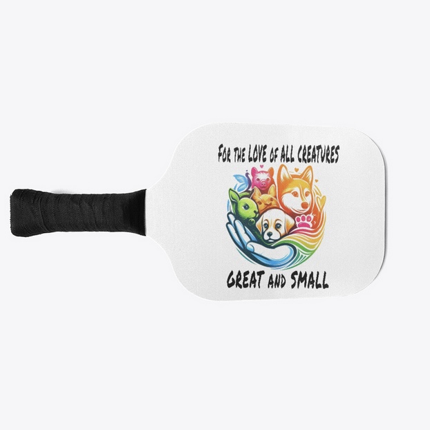 Pickleball paddle with bright colors showing animals held in a hand with the caption for the love of all creatures