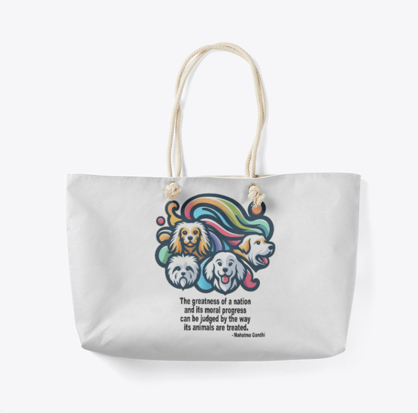 White weekender tote with colorful dog logo and the Gandhi quote, The greatness of a nation